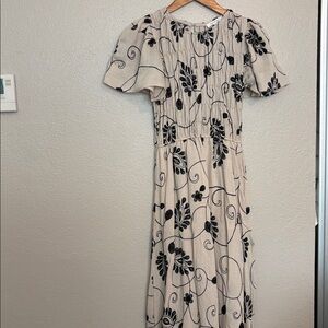 Elegant Beige and Black Floral Dress